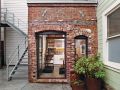 The Brick House, a self-contained guest suite built within a 94 sq ft former laundry boiler room. | www.facebook.com/SmallHouseBliss