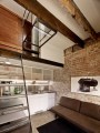 The Brick House, a self-contained guest suite built within a 94 sq ft former laundry boiler room. | www.facebook.com/SmallHouseBliss