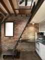 The Brick House, a self-contained guest suite built within a 94 sq ft former laundry boiler room. | www.facebook.com/SmallHouseBliss