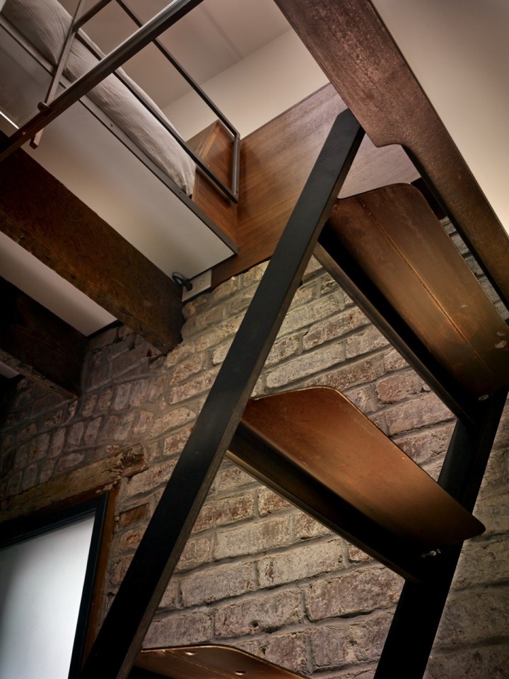 The Brick House, a self-contained guest suite built within a 94 sq ft former laundry boiler room. | www.facebook.com/SmallHouseBliss