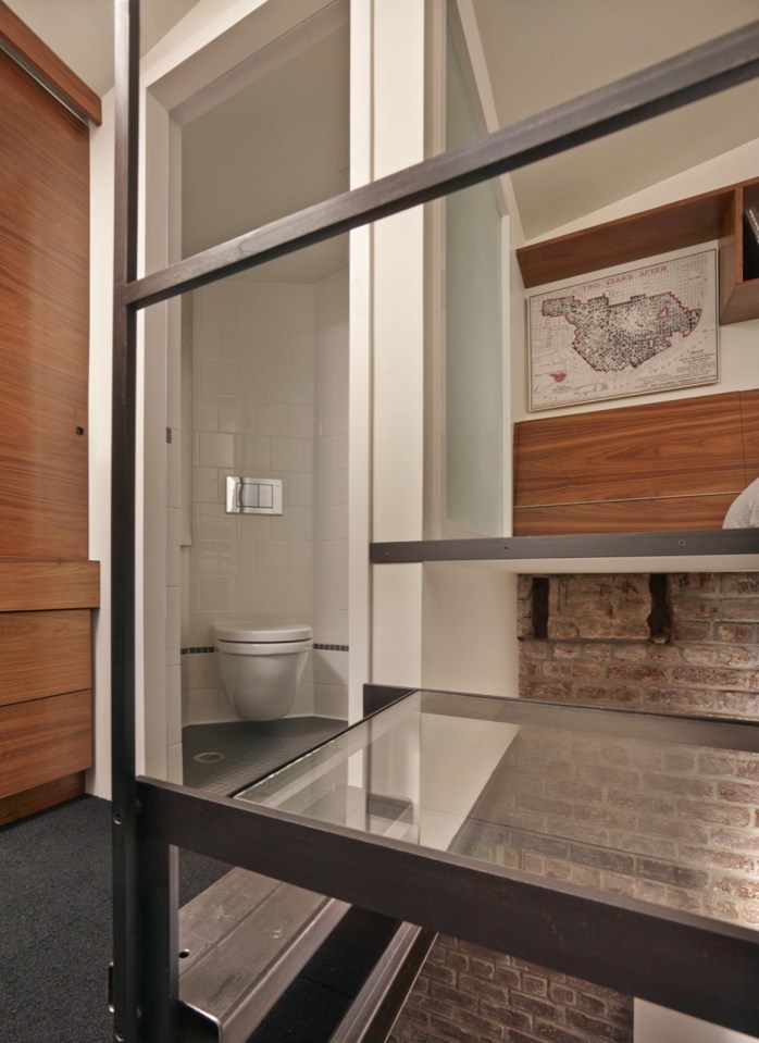 The Brick House, a self-contained guest suite built within a 94 sq ft former laundry boiler room. | www.facebook.com/SmallHouseBliss