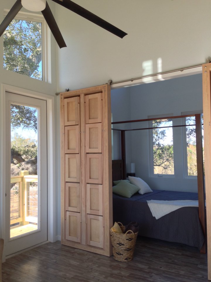 This small beach house, elevated for protection from storm surges, has one bedroom and a loft in a 24’ square footprint. | www.facebook.com/SmallHouseBliss