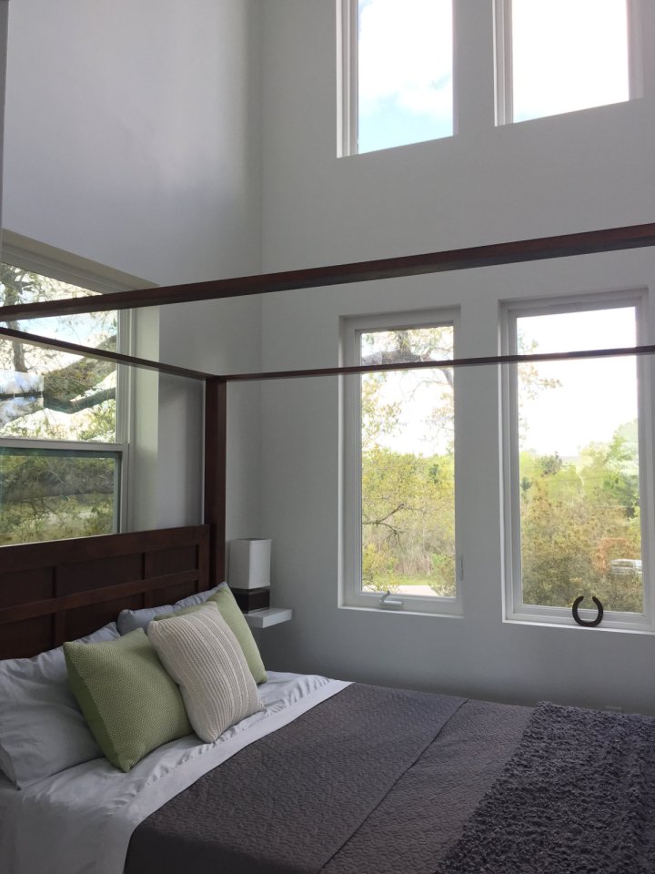 This small beach house, elevated for protection from storm surges, has one bedroom and a loft in a 24’ square footprint. | www.facebook.com/SmallHouseBliss