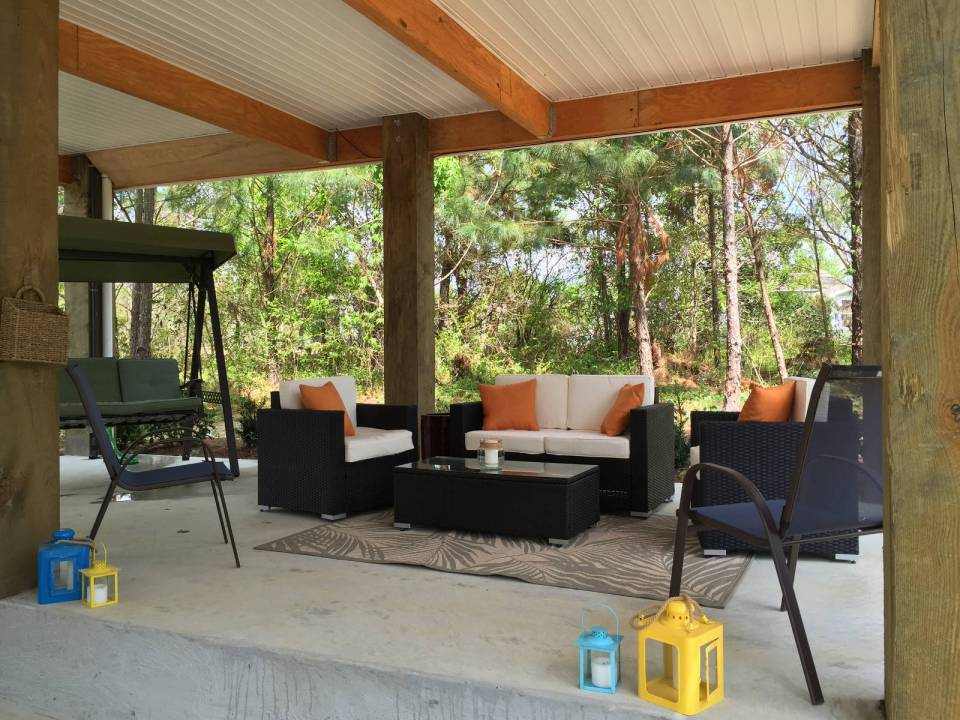 This small beach house, elevated for protection from storm surges, has one bedroom and a loft in a 24’ square footprint. | www.facebook.com/SmallHouseBliss