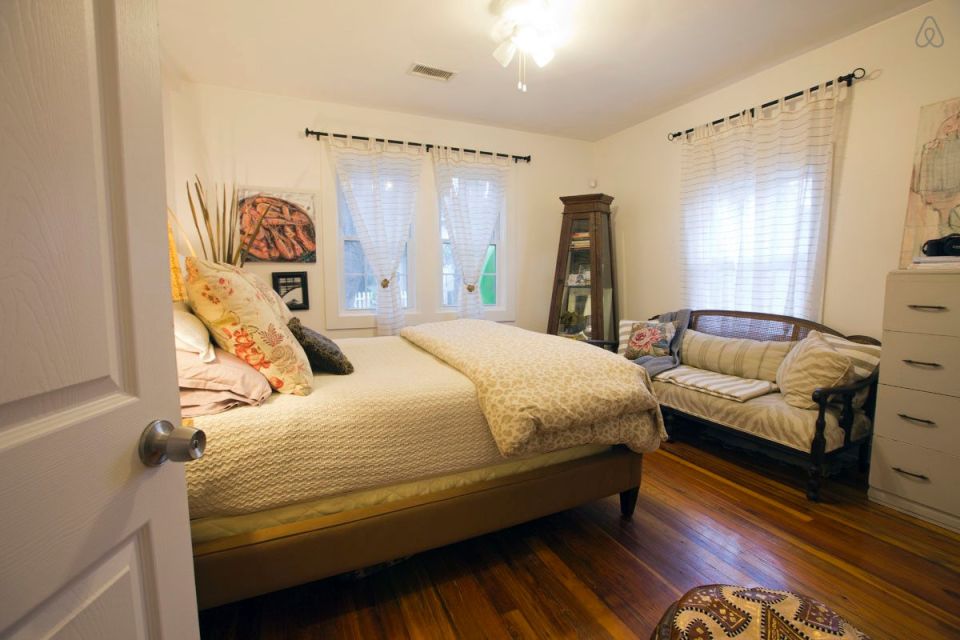 This modest two-bedroom bungalow outside Savannah, Georgia features a spacious wraparound porch. | www.facebook.com/SmallHouseBliss