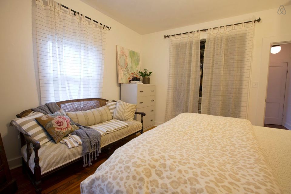 This modest two-bedroom bungalow outside Savannah, Georgia features a spacious wraparound porch. | www.facebook.com/SmallHouseBliss