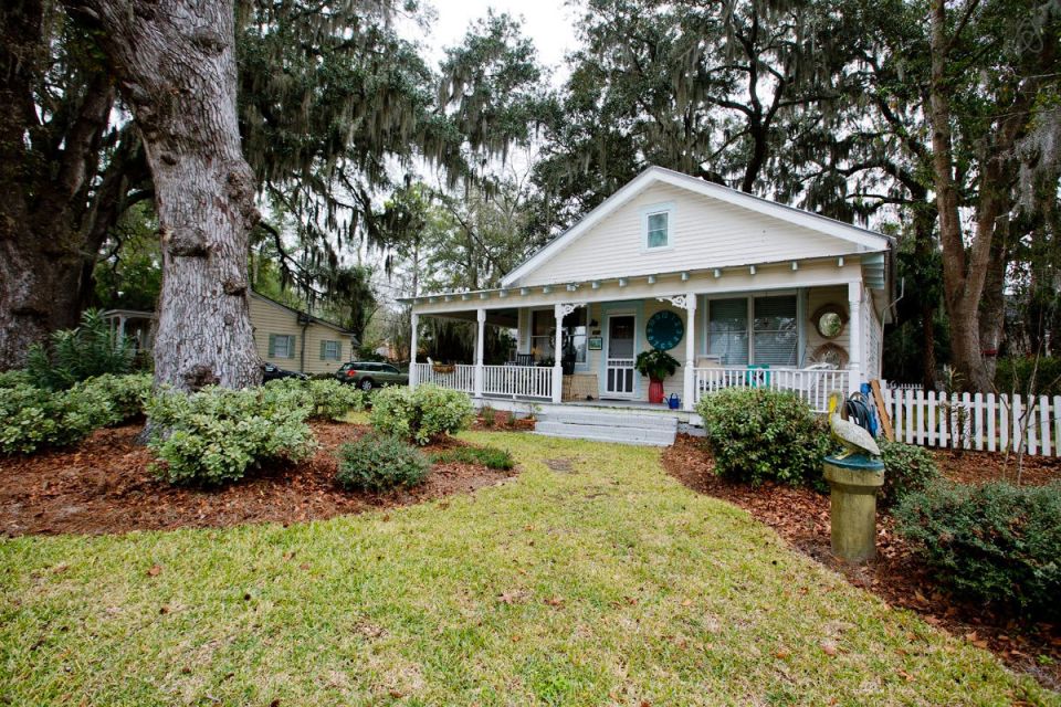 This modest two-bedroom bungalow outside Savannah, Georgia features a spacious wraparound porch. | www.facebook.com/SmallHouseBliss