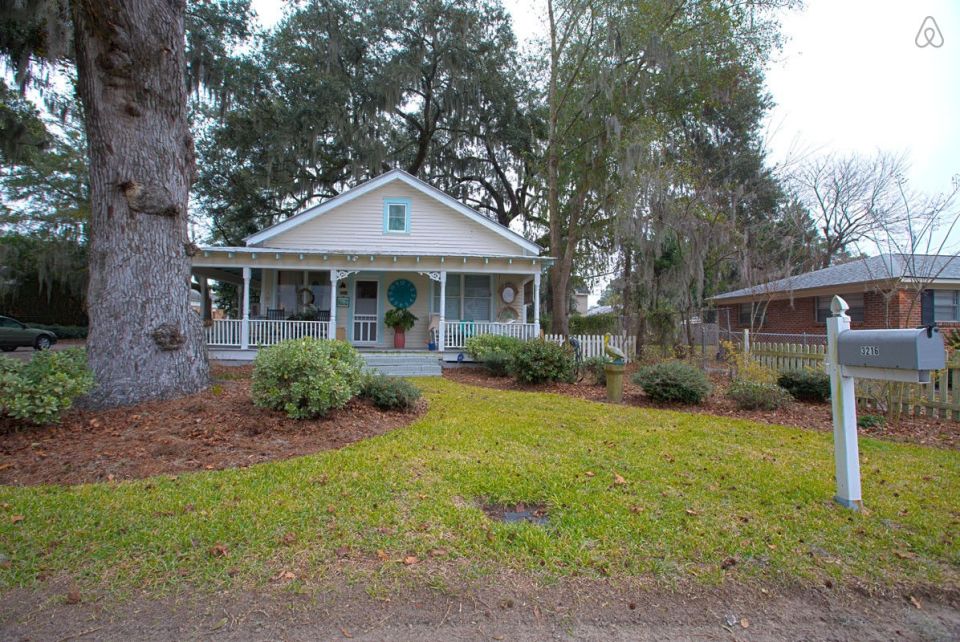 This modest two-bedroom bungalow outside Savannah, Georgia features a spacious wraparound porch. | www.facebook.com/SmallHouseBliss
