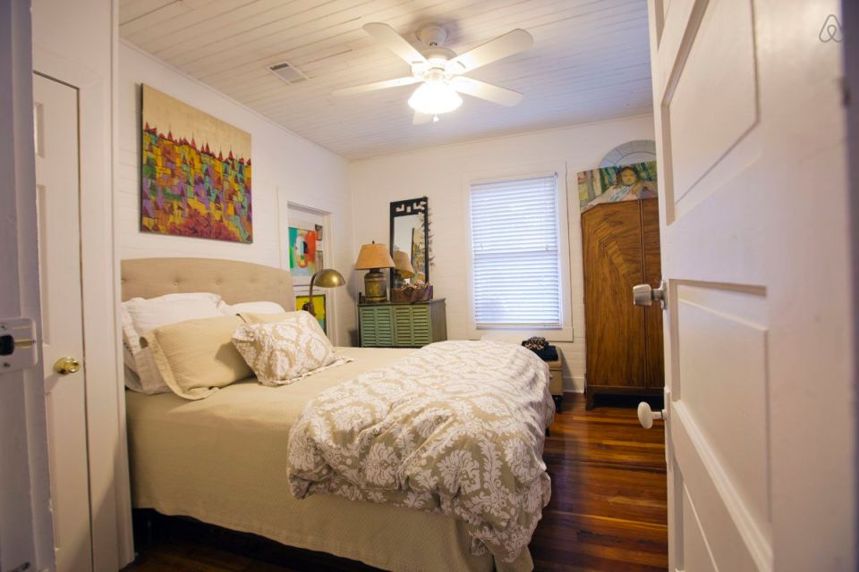 This modest two-bedroom bungalow outside Savannah, Georgia features a spacious wraparound porch. | www.facebook.com/SmallHouseBliss