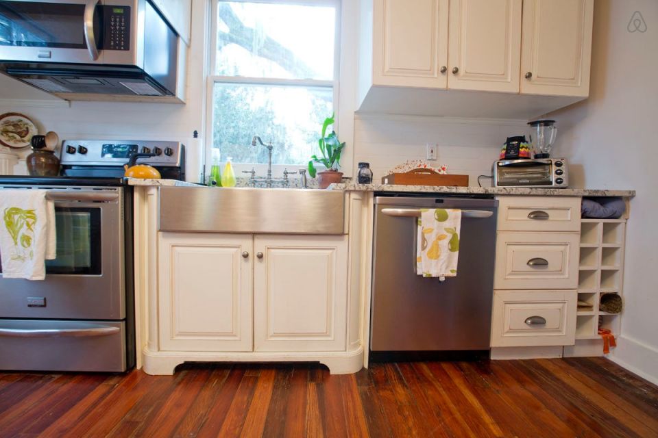 This modest two-bedroom bungalow outside Savannah, Georgia features a spacious wraparound porch. | www.facebook.com/SmallHouseBliss