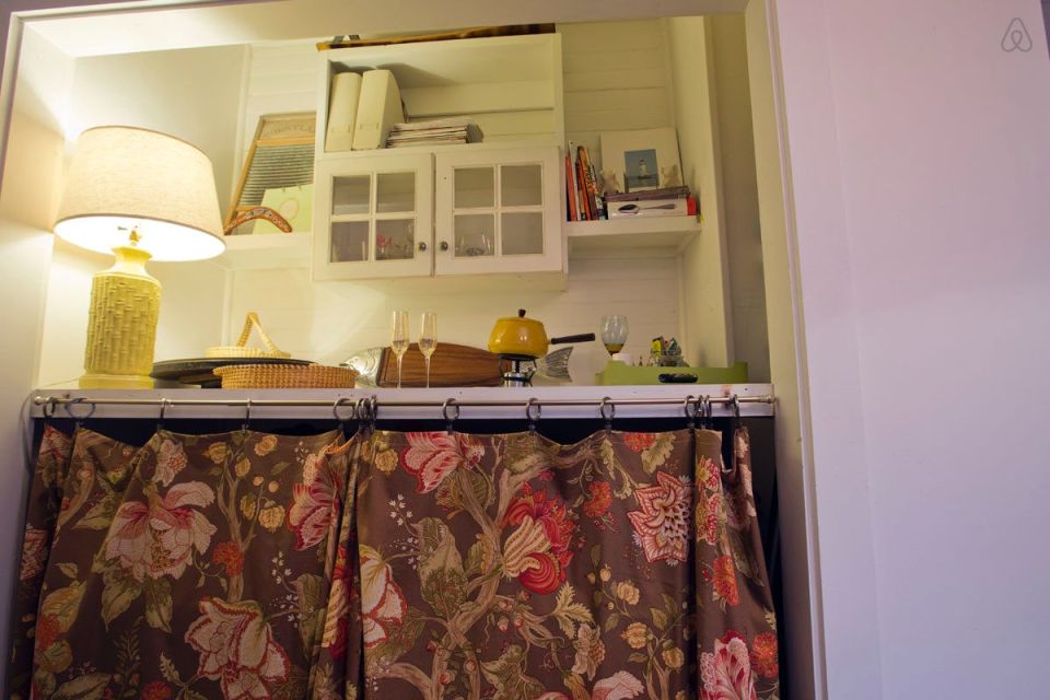 This modest two-bedroom bungalow outside Savannah, Georgia features a spacious wraparound porch. | www.facebook.com/SmallHouseBliss