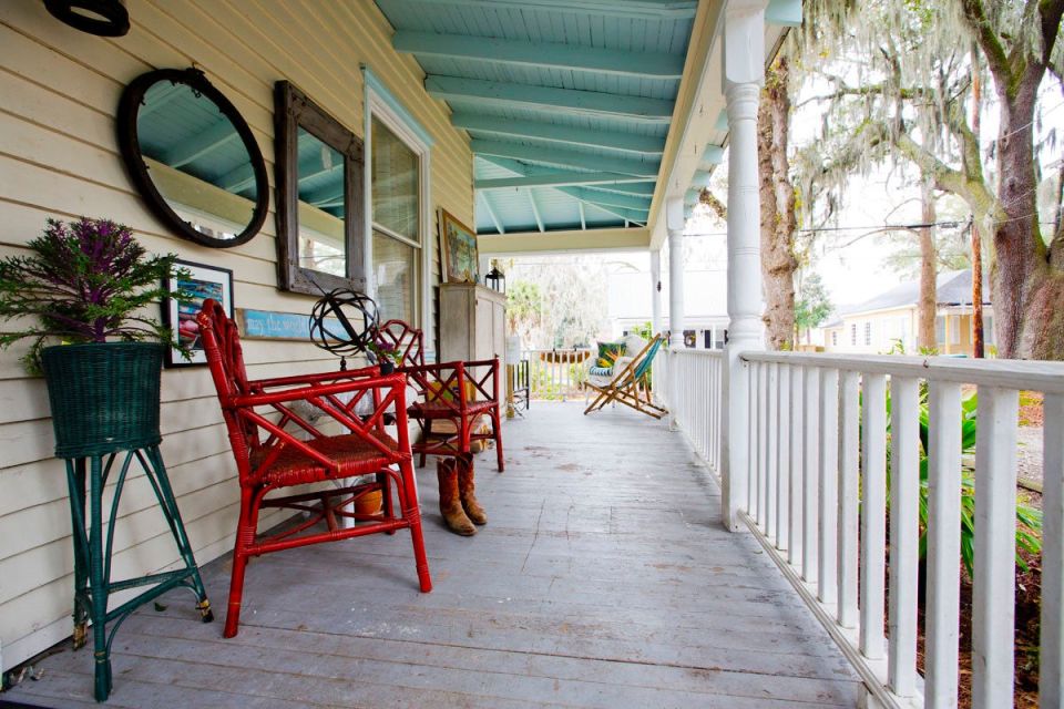 This modest two-bedroom bungalow outside Savannah, Georgia features a spacious wraparound porch. | www.facebook.com/SmallHouseBliss
