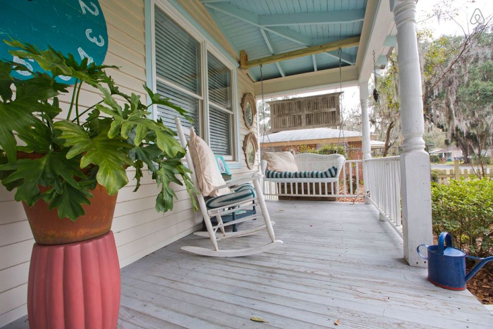 This modest two-bedroom bungalow outside Savannah, Georgia features a spacious wraparound porch. | www.facebook.com/SmallHouseBliss