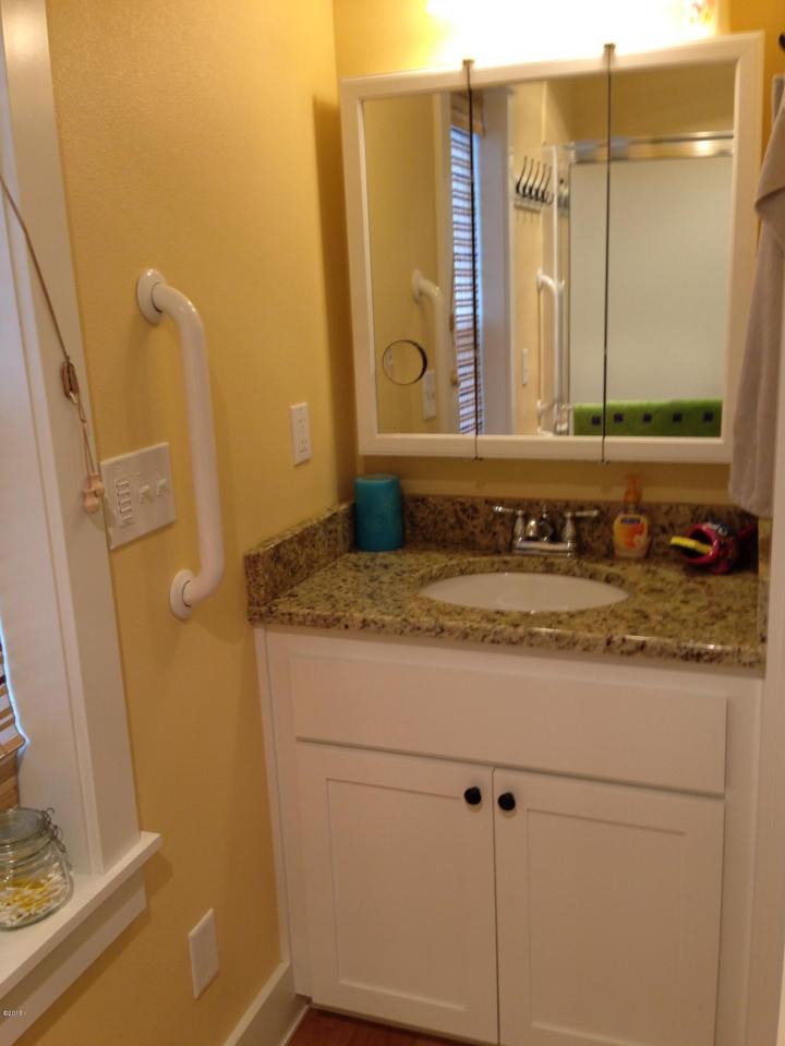 With a ground-floor bedroom, this tiny cottage on the Oregon Coast supports single-level living. It has a 416 sq ft main level plus a sleeping loft. | www.facebook.com/SmallHouseBliss