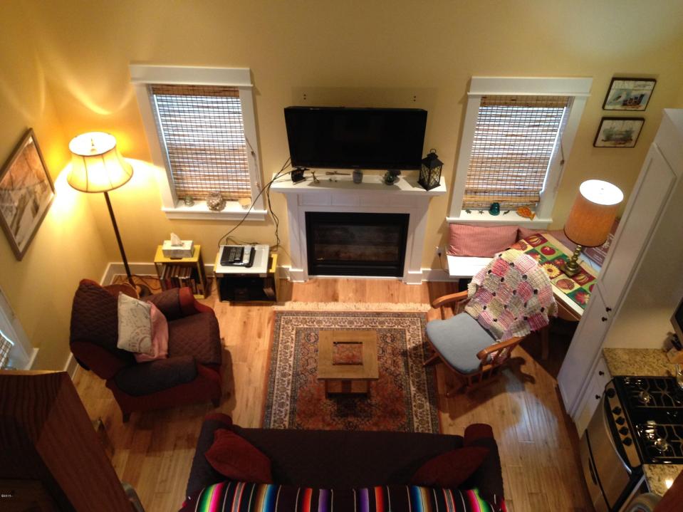 With a ground-floor bedroom, this tiny cottage on the Oregon Coast supports single-level living. It has a 416 sq ft main level plus a sleeping loft. | www.facebook.com/SmallHouseBliss