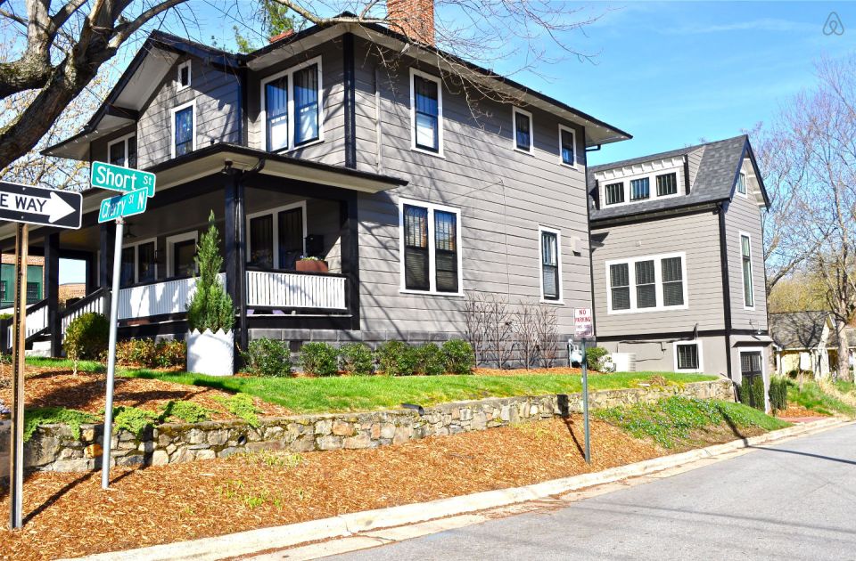 The Birdhouse, a tall and skinny tiny house with the kitchen, living room and bedroom each occupying one of the three floors. | www.facebook.com/SmallHouseBliss