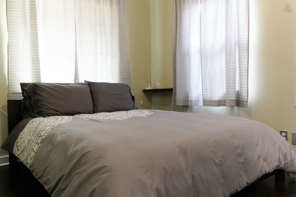 This 1922 cottage is one of six in a California “bungalow court”. It has one bedroom on the 416 sq ft main level plus a sleeping loft. | www.facebook.com/SmallHouseBliss