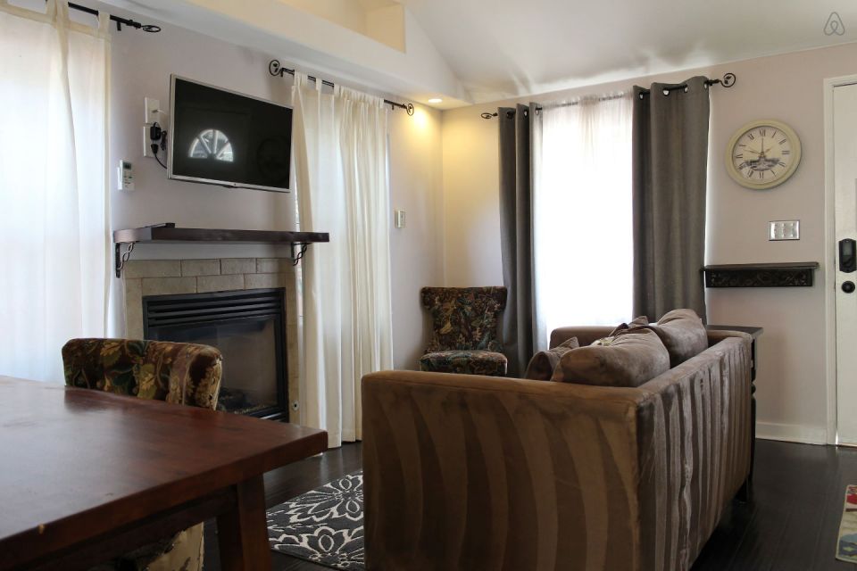 This 1922 cottage is one of six in a California “bungalow court”. It has one bedroom on the 416 sq ft main level plus a sleeping loft. | www.facebook.com/SmallHouseBliss