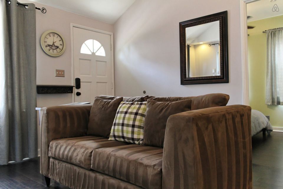 This 1922 cottage is one of six in a California “bungalow court”. It has one bedroom on the 416 sq ft main level plus a sleeping loft. | www.facebook.com/SmallHouseBliss