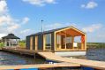 DublDom Houseboat, a modular floating cabin with a 280 sq ft studio floor plan. | www.facebook.com/SmallHouseBliss