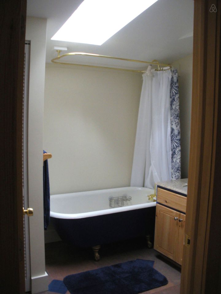 This older cottage in the woods near Asheville, NC, was renovated by the owners to create a cozy 600 sq ft home with one bedroom. | www.facebook.com/SmallHouseBliss