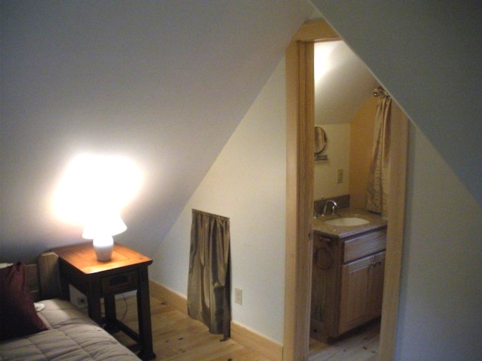 This older cottage in the woods near Asheville, NC, was renovated by the owners to create a cozy 600 sq ft home with one bedroom. | www.facebook.com/SmallHouseBliss