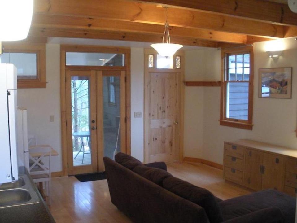 This older cottage in the woods near Asheville, NC, was renovated by the owners to create a cozy 600 sq ft home with one bedroom. | www.facebook.com/SmallHouseBliss