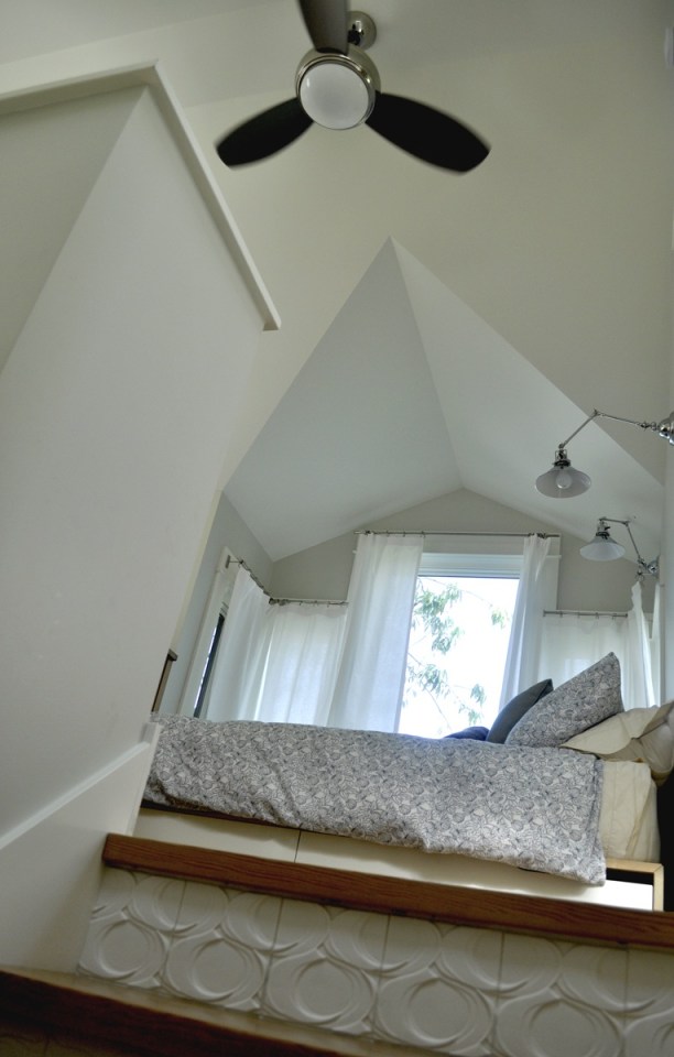 This tiny 2-storey guest cottage has one bedroom in 342 sq ft. | www.facebook.com/SmallHouseBliss