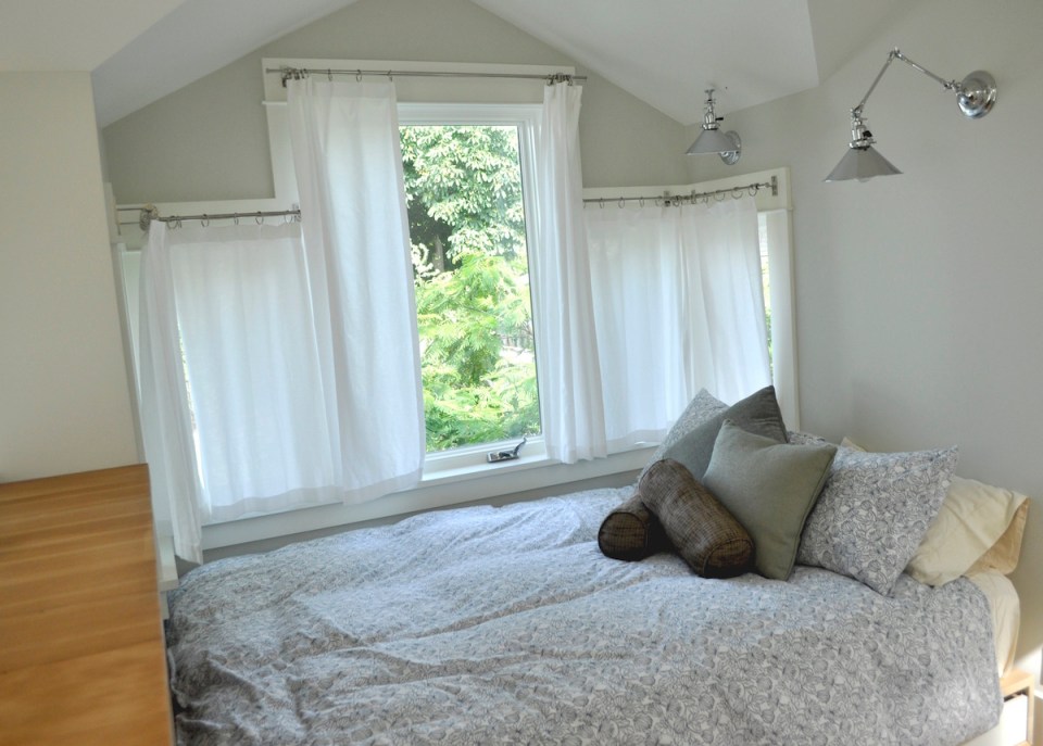 This tiny 2-storey guest cottage has one bedroom in 342 sq ft. | www.facebook.com/SmallHouseBliss