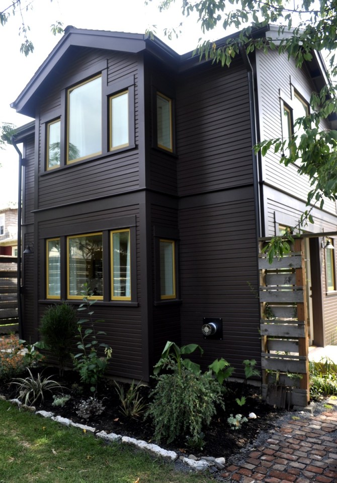 This tiny 2-storey guest cottage has one bedroom in 342 sq ft. | www.facebook.com/SmallHouseBliss