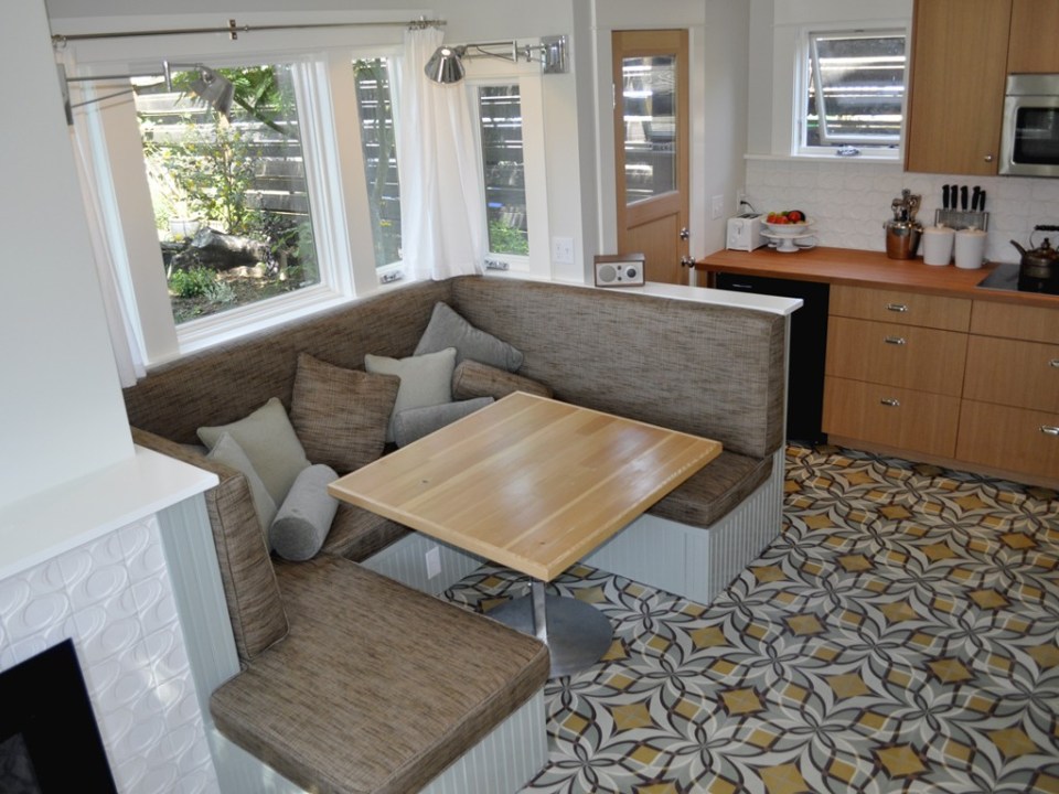 This tiny 2-storey guest cottage has one bedroom in 342 sq ft. | www.facebook.com/SmallHouseBliss