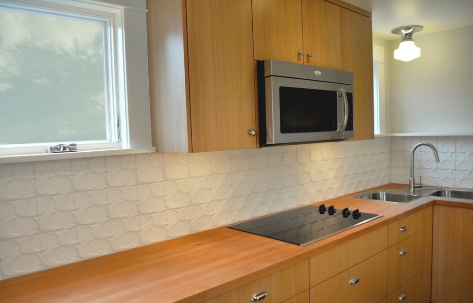 This tiny 2-storey guest cottage has one bedroom in 342 sq ft. | www.facebook.com/SmallHouseBliss