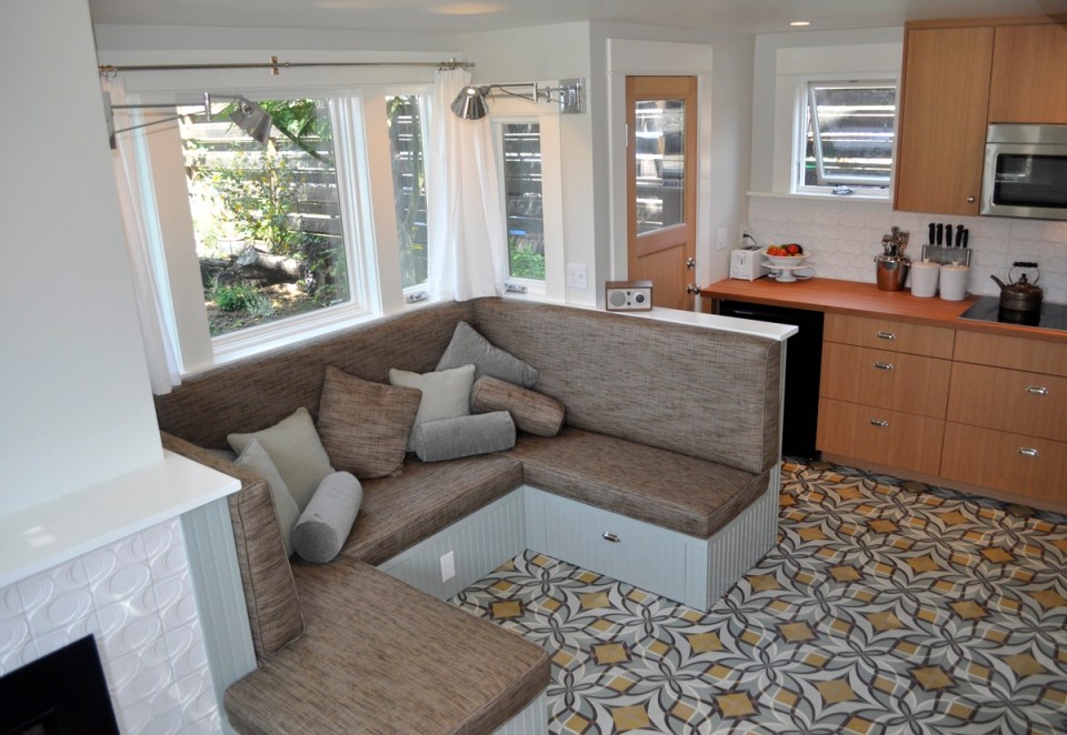 This tiny 2-storey guest cottage has one bedroom in 342 sq ft. | www.facebook.com/SmallHouseBliss