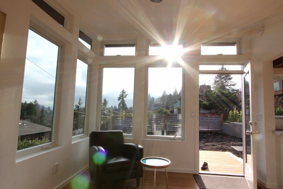 Modern backyard cottage in Seattle with one bedroom and a loft in 650 sq ft. | www.facebook.com/SmallHouseBliss