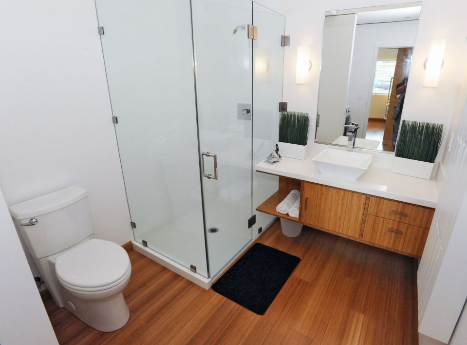 INhouse, an entry at Solar Decathlon 2015, has a covering of redwood strips to shade the walls and keep the home cooler. It has one bedroom plus a flex space in 986 sq ft. | www.facebook.com/SmallHouseBliss