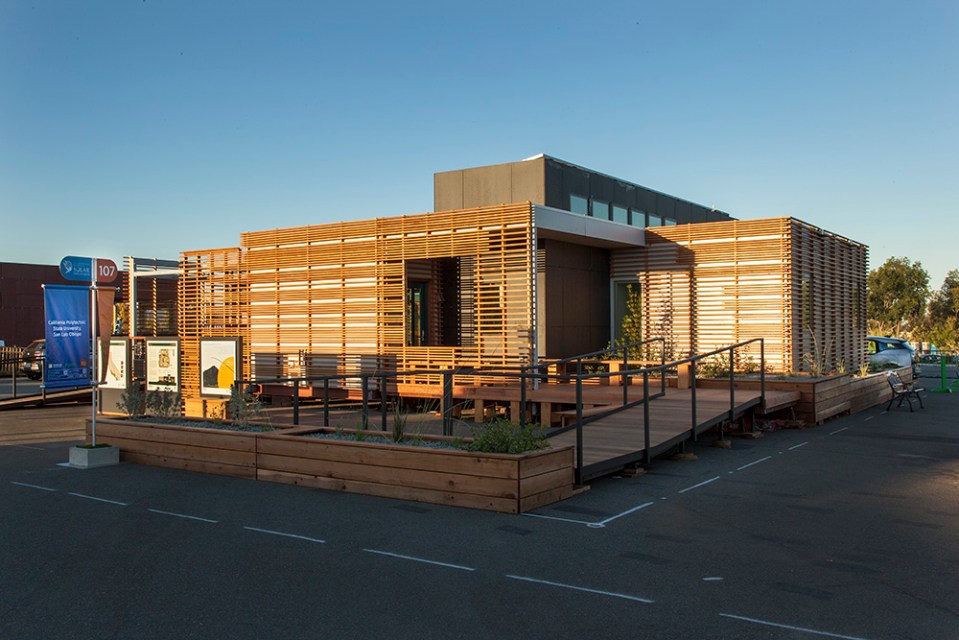 INhouse, an entry at Solar Decathlon 2015, has a covering of redwood strips to shade the walls and keep the home cooler. It has one bedroom plus a flex space in 986 sq ft. | www.facebook.com/SmallHouseBliss