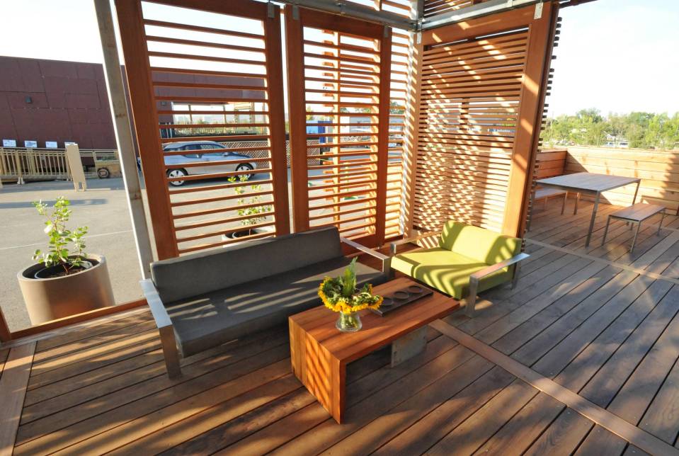 INhouse, an entry at Solar Decathlon 2015, has a covering of redwood strips to shade the walls and keep the home cooler. It has one bedroom plus a flex space in 986 sq ft. | www.facebook.com/SmallHouseBliss