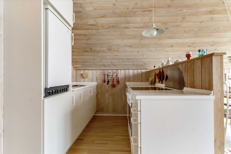 This tiny sod-roofed house sits among the sand dunes in northern Denmark. It has one bedroom in 430 sq ft. | www.facebook.com/SmallHouseBliss