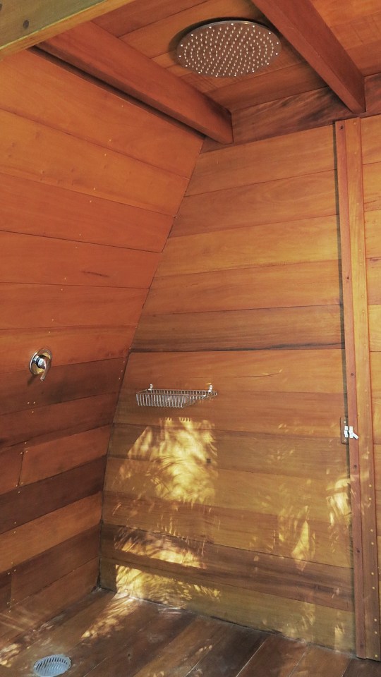 "Arca", an arched retreat in the Brazilian rainforest created from a prefab metal building. It has two bedrooms in 781 sq ft. | www.facebook.com/SmallHouseBliss