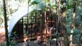 "Arca", an arched retreat in the Brazilian rainforest created from a prefab metal building. It has two bedrooms in 781 sq ft. | www.facebook.com/SmallHouseBliss