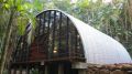 "Arca", an arched retreat in the Brazilian rainforest created from a prefab metal building. It has two bedrooms in 781 sq ft. | www.facebook.com/SmallHouseBliss