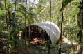 "Arca", an arched retreat in the Brazilian rainforest created from a prefab metal building. It has two bedrooms in 781 sq ft. | www.facebook.com/SmallHouseBliss