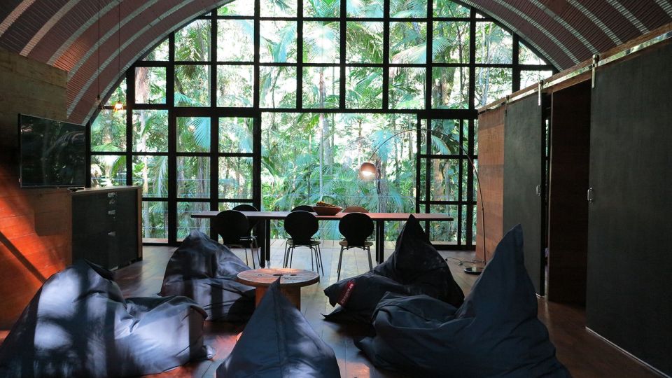 "Arca", an arched retreat in the Brazilian rainforest created from a prefab metal building. It has two bedrooms in 781 sq ft. | www.facebook.com/SmallHouseBliss