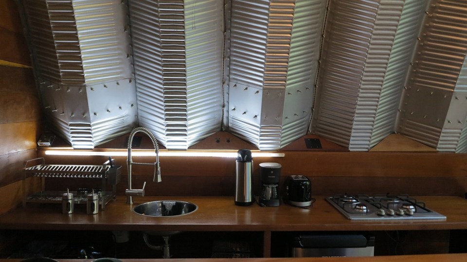 "Arca", an arched retreat in the Brazilian rainforest created from a prefab metal building. It has two bedrooms in 781 sq ft. | www.facebook.com/SmallHouseBliss