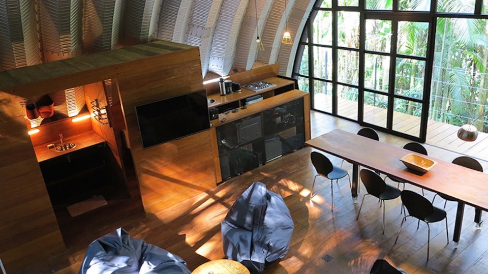 "Arca", an arched retreat in the Brazilian rainforest created from a prefab metal building. It has two bedrooms in 781 sq ft. | www.facebook.com/SmallHouseBliss