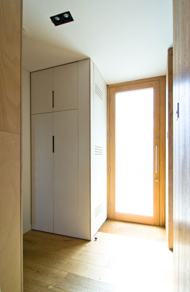 A brick coach house in London dating back to the 1800s was renovated with a new interior that makes extensive use of birch plywood. | www.facebook.com/SmallHouseBliss