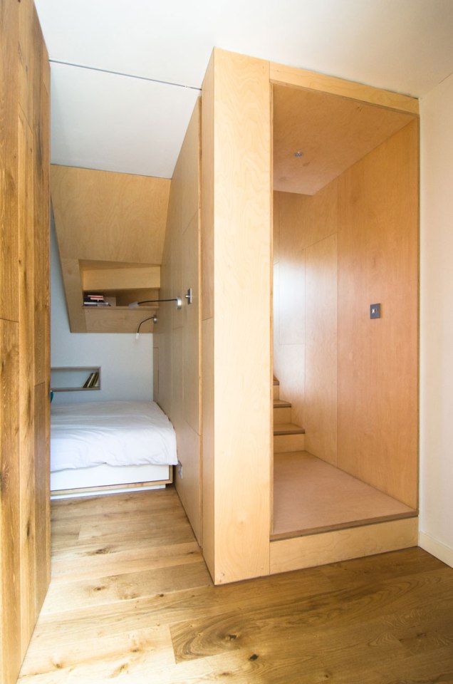 A brick coach house in London dating back to the 1800s was renovated with a new interior that makes extensive use of birch plywood. | www.facebook.com/SmallHouseBliss