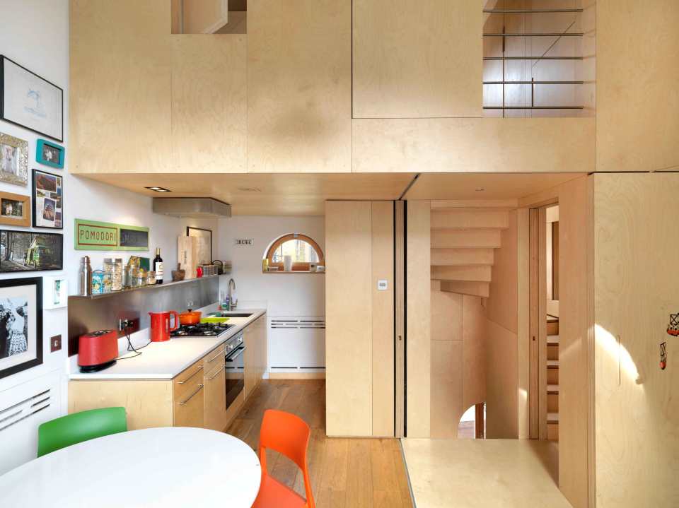 A brick coach house in London dating back to the 1800s was renovated with a new interior that makes extensive use of birch plywood. | www.facebook.com/SmallHouseBliss