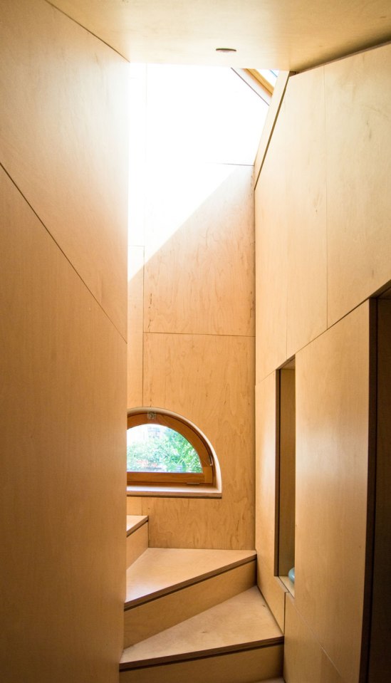 A brick coach house in London dating back to the 1800s was renovated with a new interior that makes extensive use of birch plywood. | www.facebook.com/SmallHouseBliss