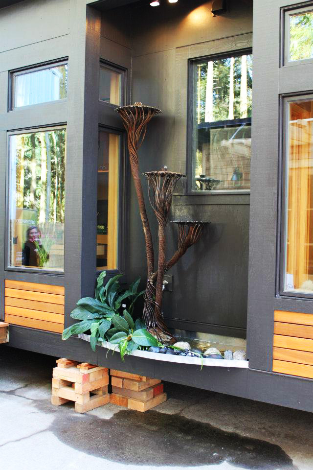 The Waterhaus, a tiny sustainable prefab designed for a healthy indoor environment. It has one bedroom in 450 sq ft. | www.facebook.com/SmallHouseBliss